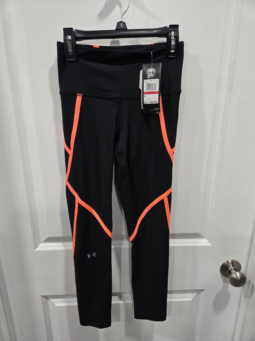 Under Armour Women’s Black Capri Leggings with Neon Orange Trim